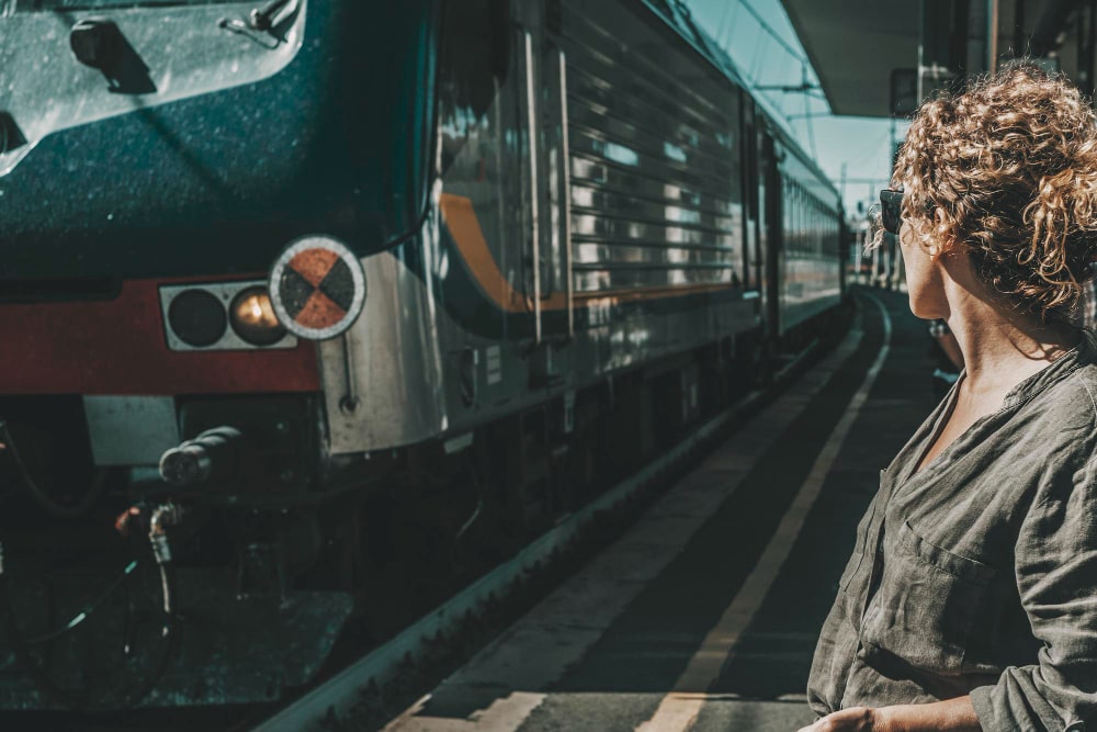 one-tourist-traveler-woman-waiting-train-station